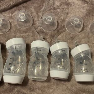 6 playtex baby bottles 4 slow nipples 1 medium 1 missing 6 & 8 oz